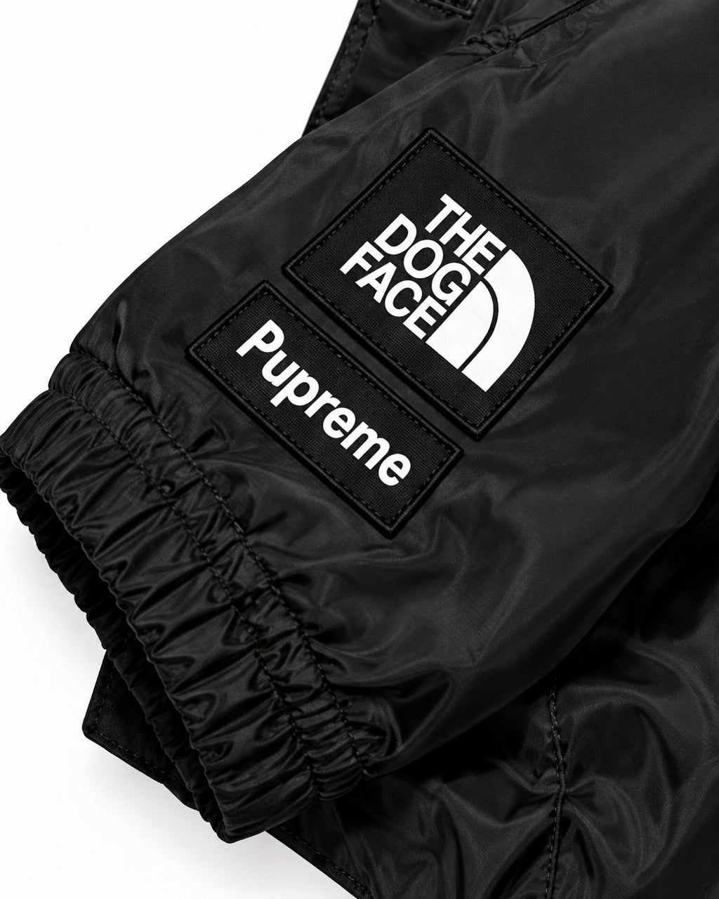 Dog Waterproof Jacket in black, sleeve labels detail